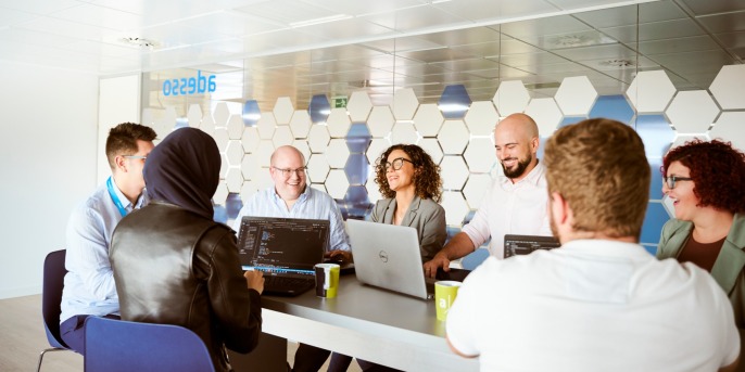 A group of people having a meeting